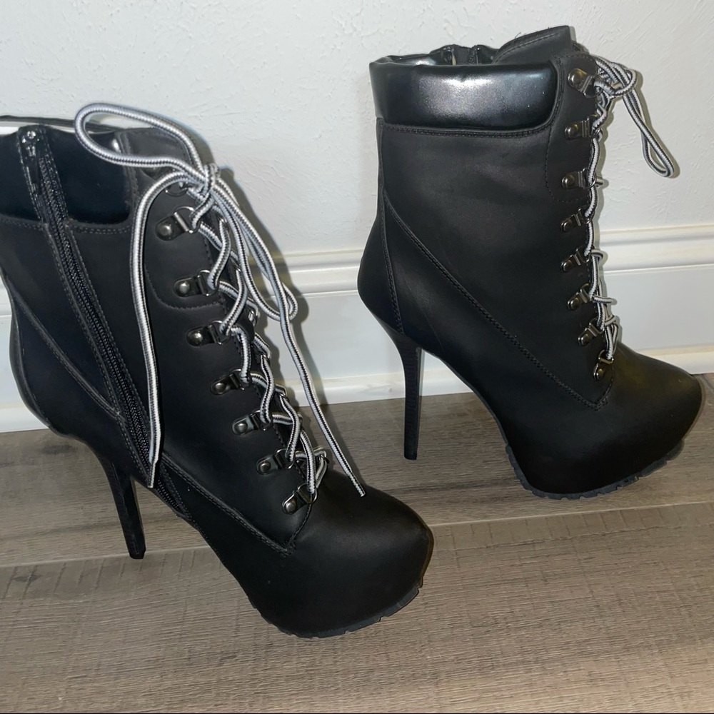 Black platform combat boot heels